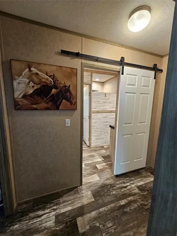 a bathroom with a shower and a mirror