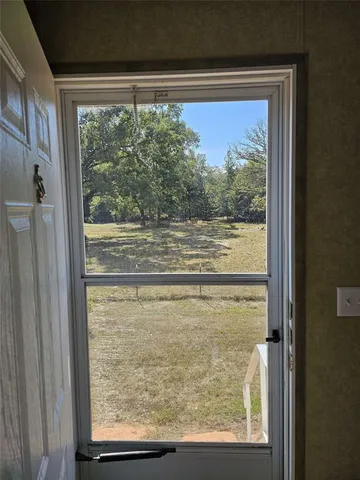 a house with yard in front of it
