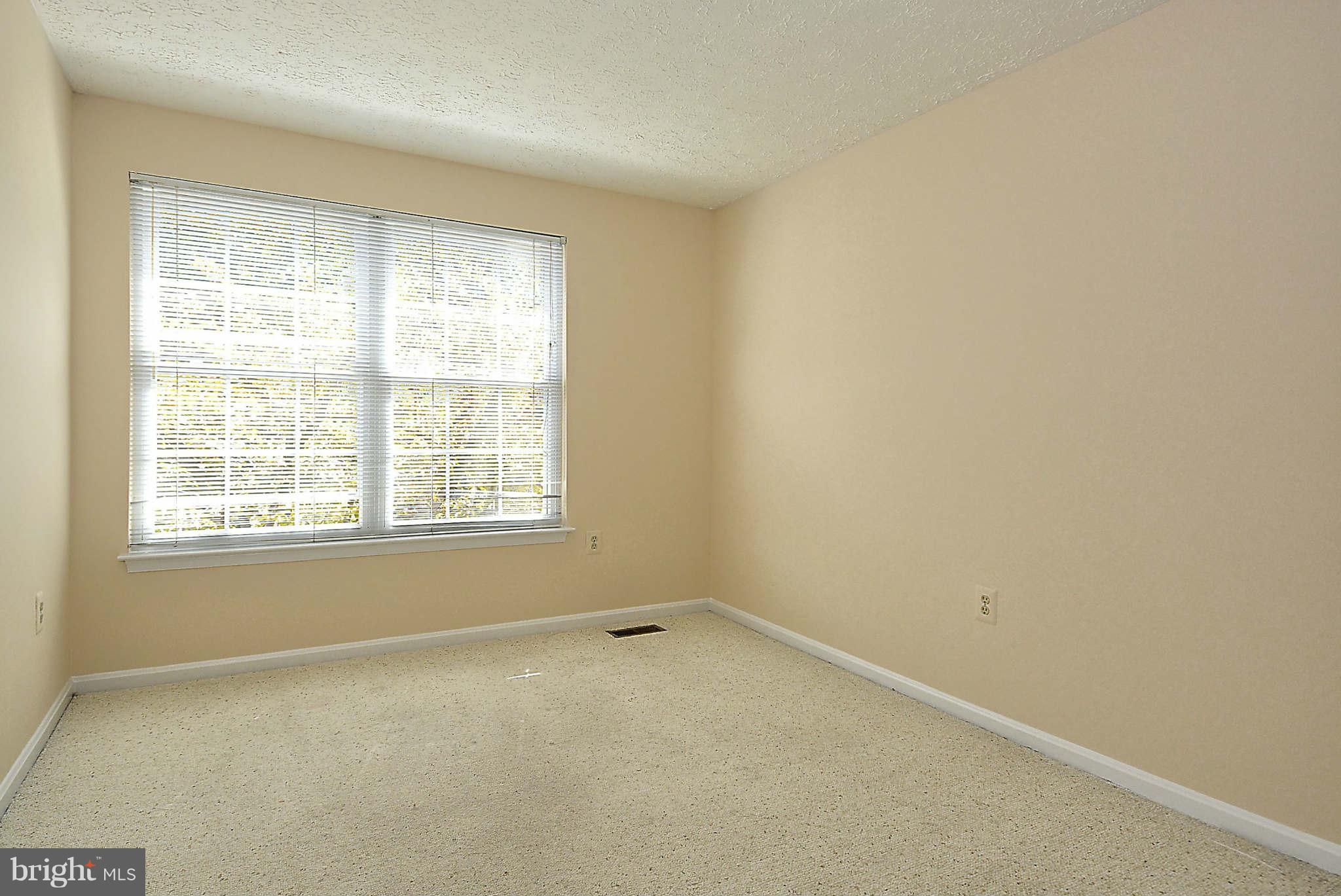 11457 Encore Drive Silver Spring, MD 20901 - Photo 11 of 27 an empty room with a window
