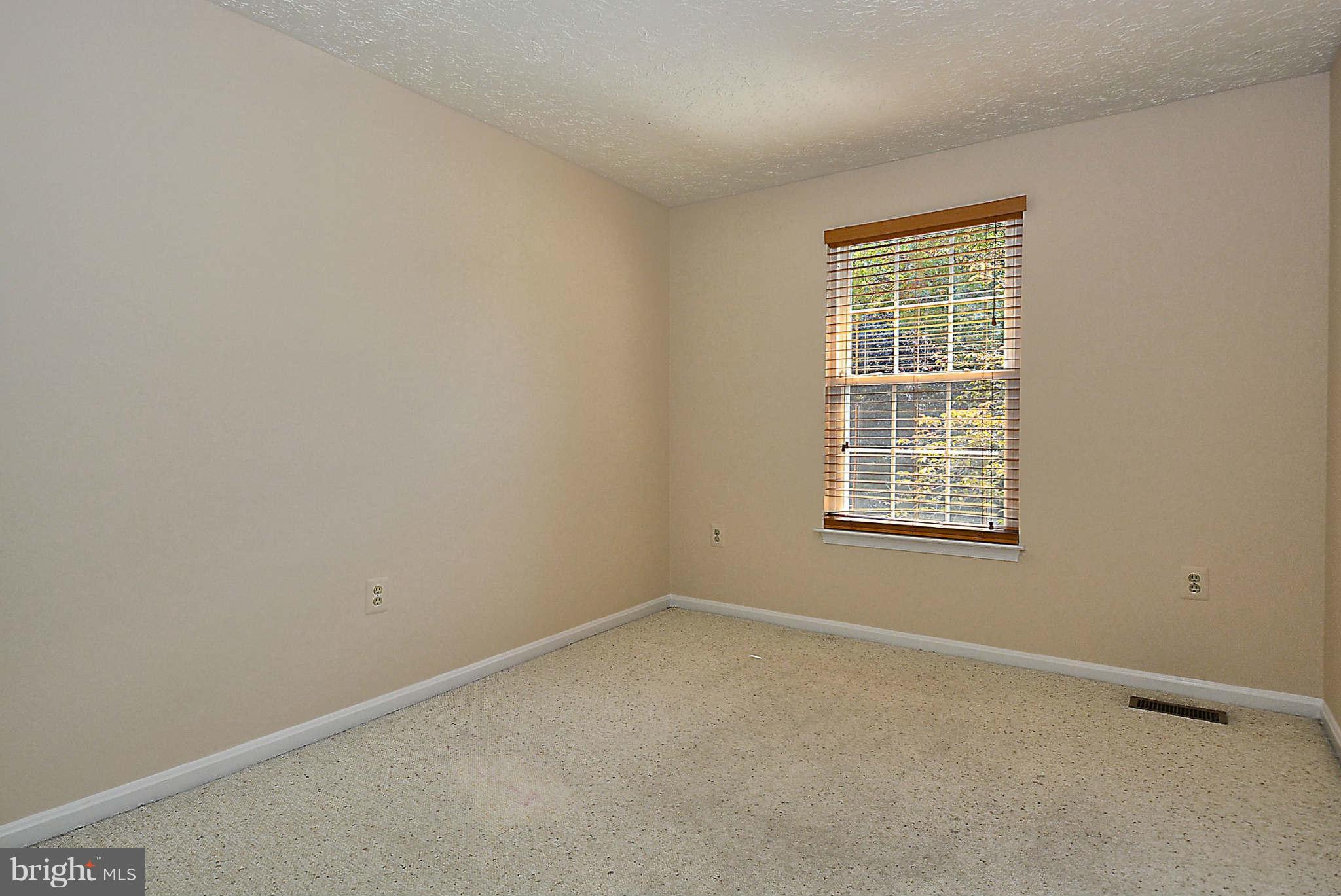 11457 Encore Drive Silver Spring, MD 20901 - Photo 14 of 27 an empty room with a window