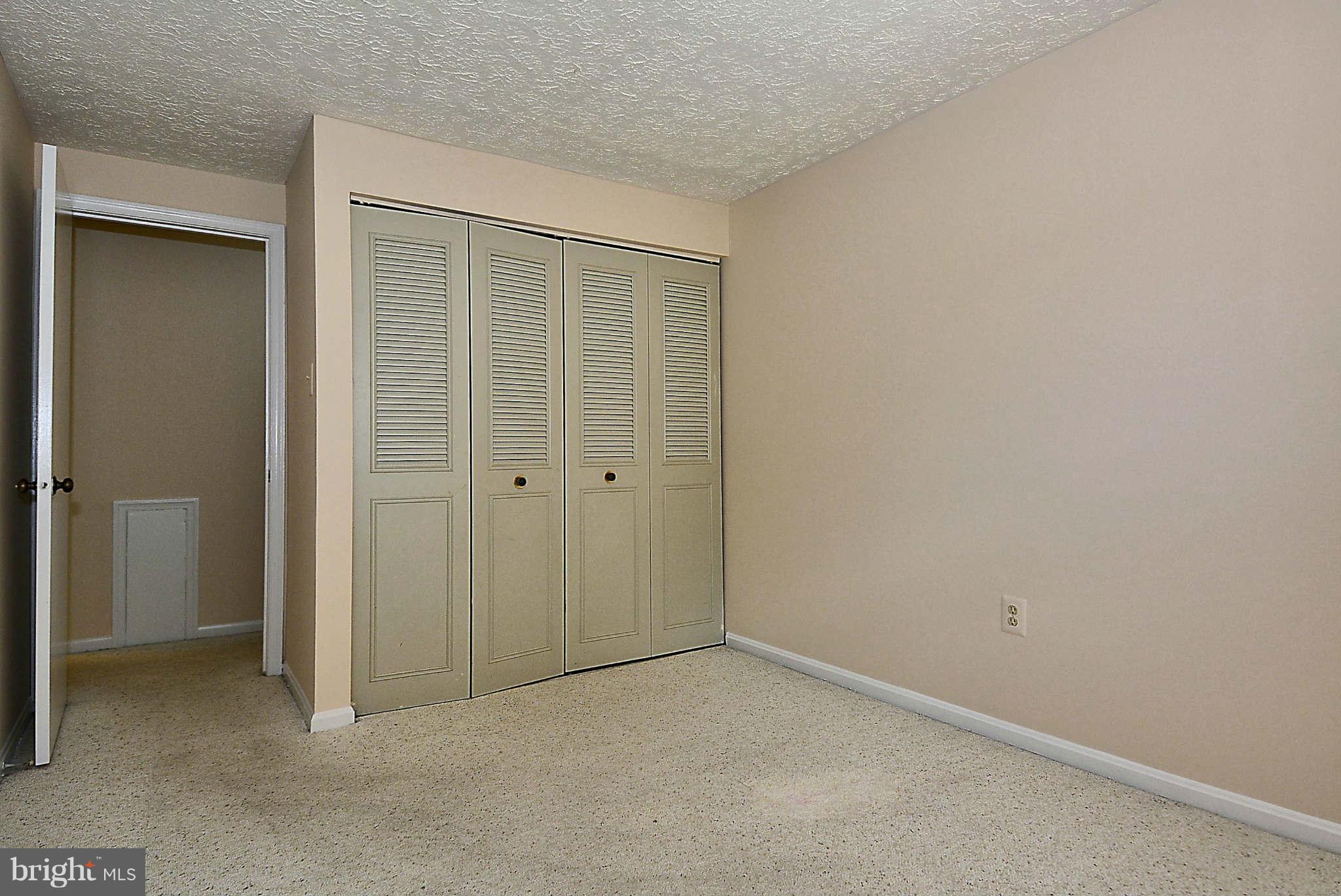 11457 Encore Drive Silver Spring, MD 20901 - Photo 15 of 27 an empty room with closet area