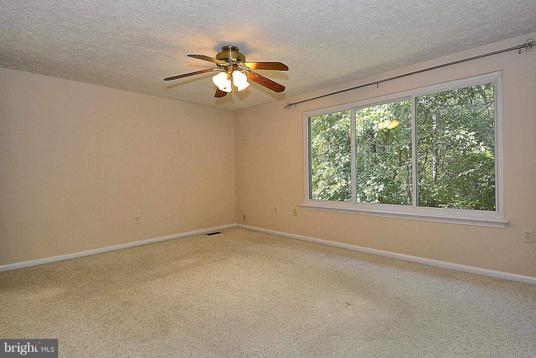 11457 Encore Drive Silver Spring, MD 20901 - Photo 17 of 27 a view of an empty room with a window