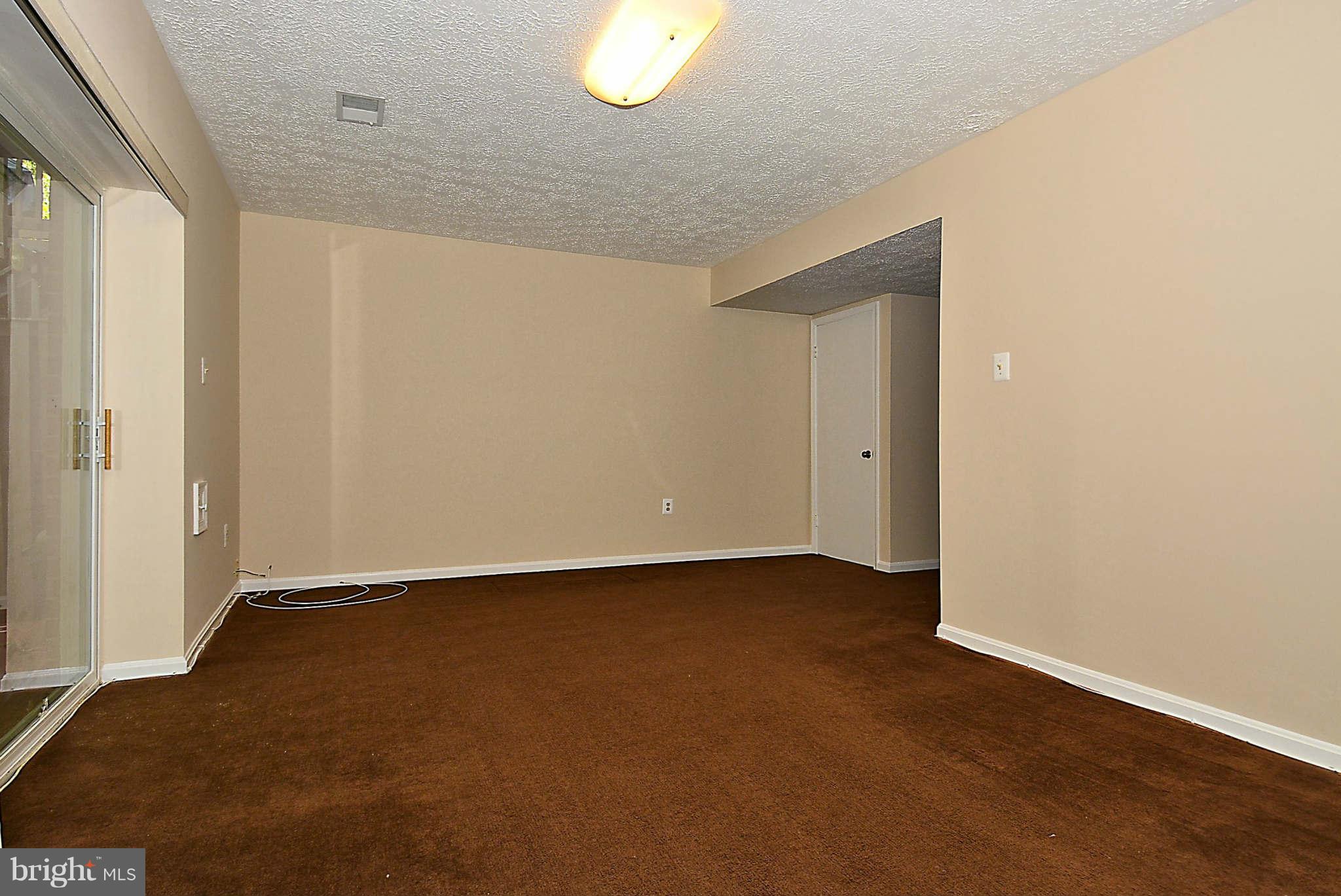 11457 Encore Drive Silver Spring, MD 20901 - Photo 22 of 27 an empty room with closet area