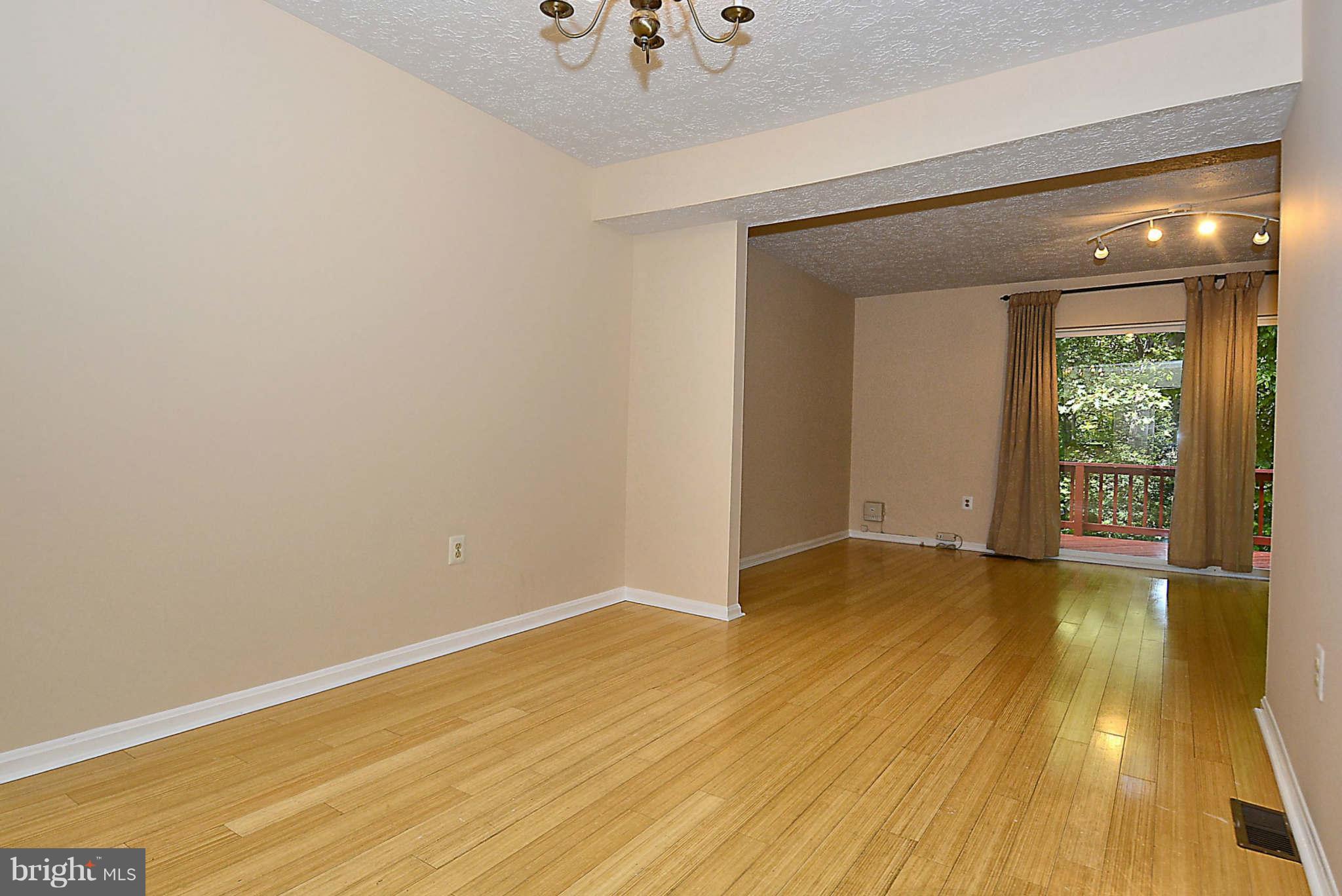 11457 Encore Drive Silver Spring, MD 20901 - Photo 6 of 27 a view of an empty room with glass door