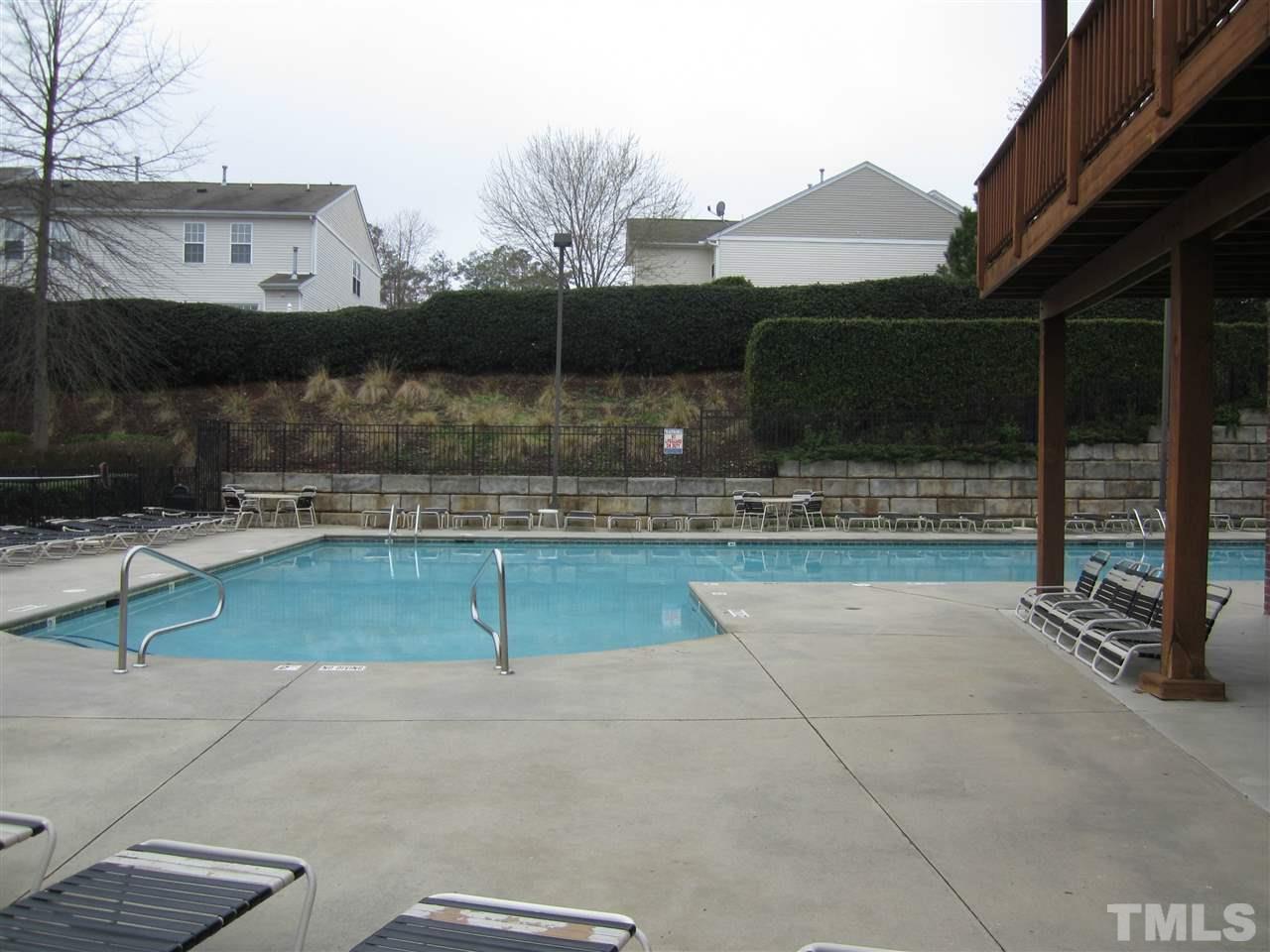 8217 Beaded Stone Street Raleigh, NC 27613 - Photo 16 of 16 a view of a backyard