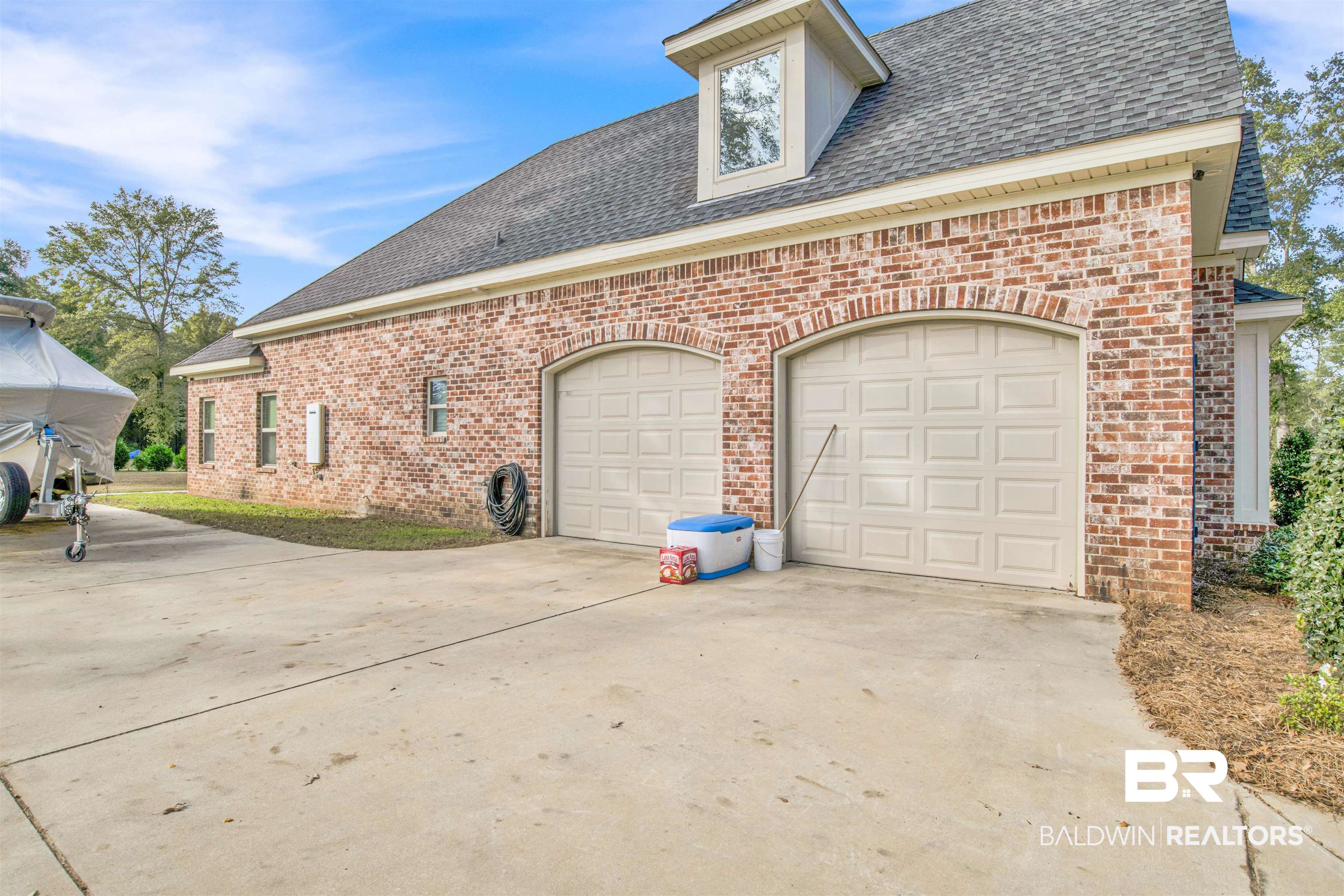 2440 Johnson Road West Mobile, AL 36695 - Photo 6 of 40 Exterior space featuring a garage