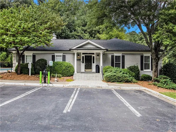 front view of a house with a small yard