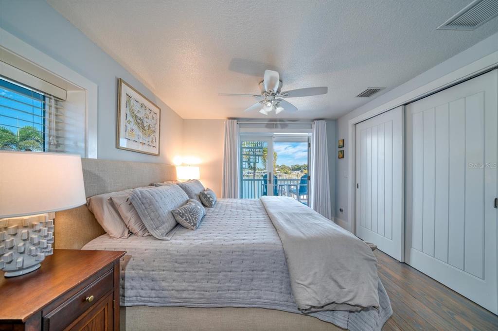 478 20th Avenue Indian Rocks Beach, FL 33785 - Photo 30 of 80 Primary bedroom on second floor and covered balcony