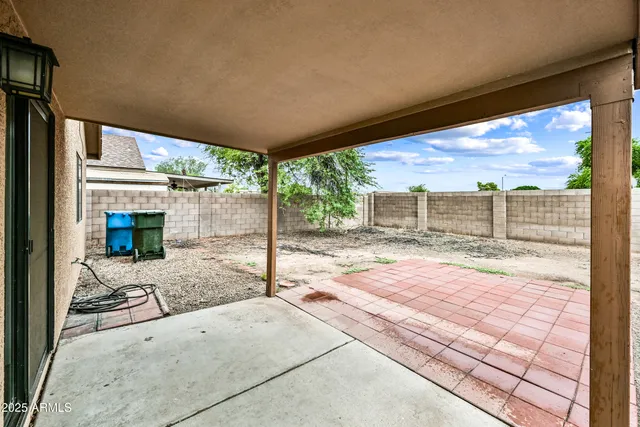 a house with yard in front of it