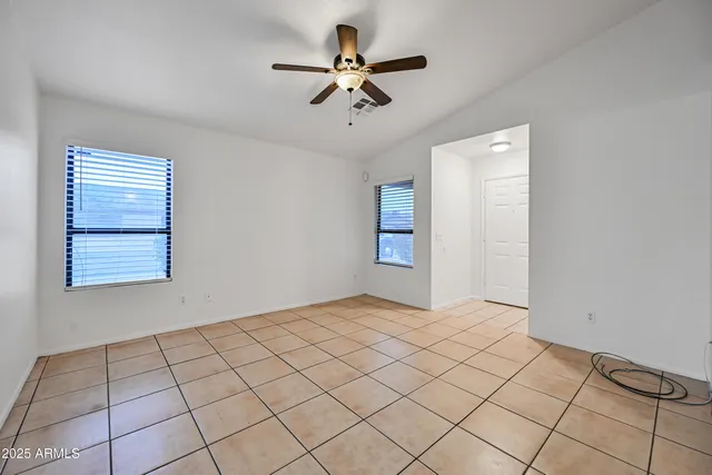 a view of an empty room and window