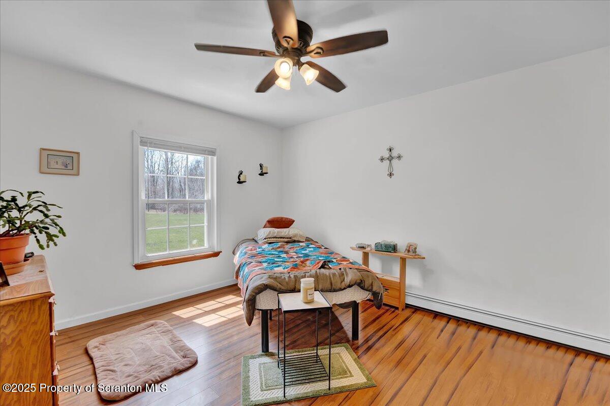 3330 Quicktown Road Moscow, PA 18444 - Photo 16 of 34 a living room with furniture and a window