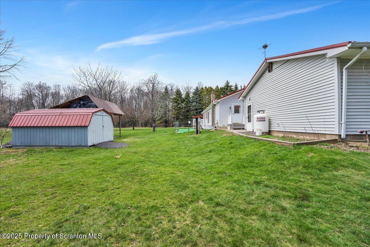 3330 Quicktown Road Moscow, PA 18444 - Photo 26 of 34 a view of a house with backyard and garden