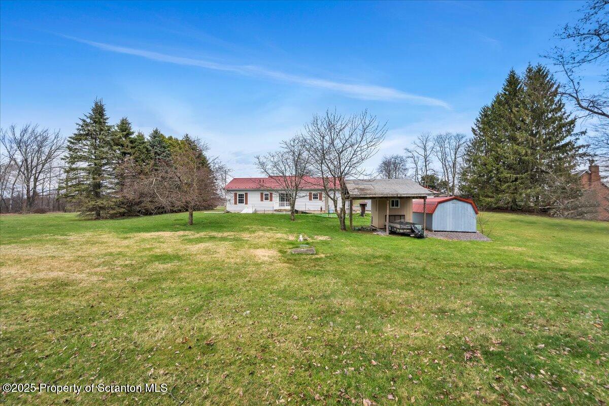 3330 Quicktown Road Moscow, PA 18444 - Photo 27 of 34 a view of a house with a yard