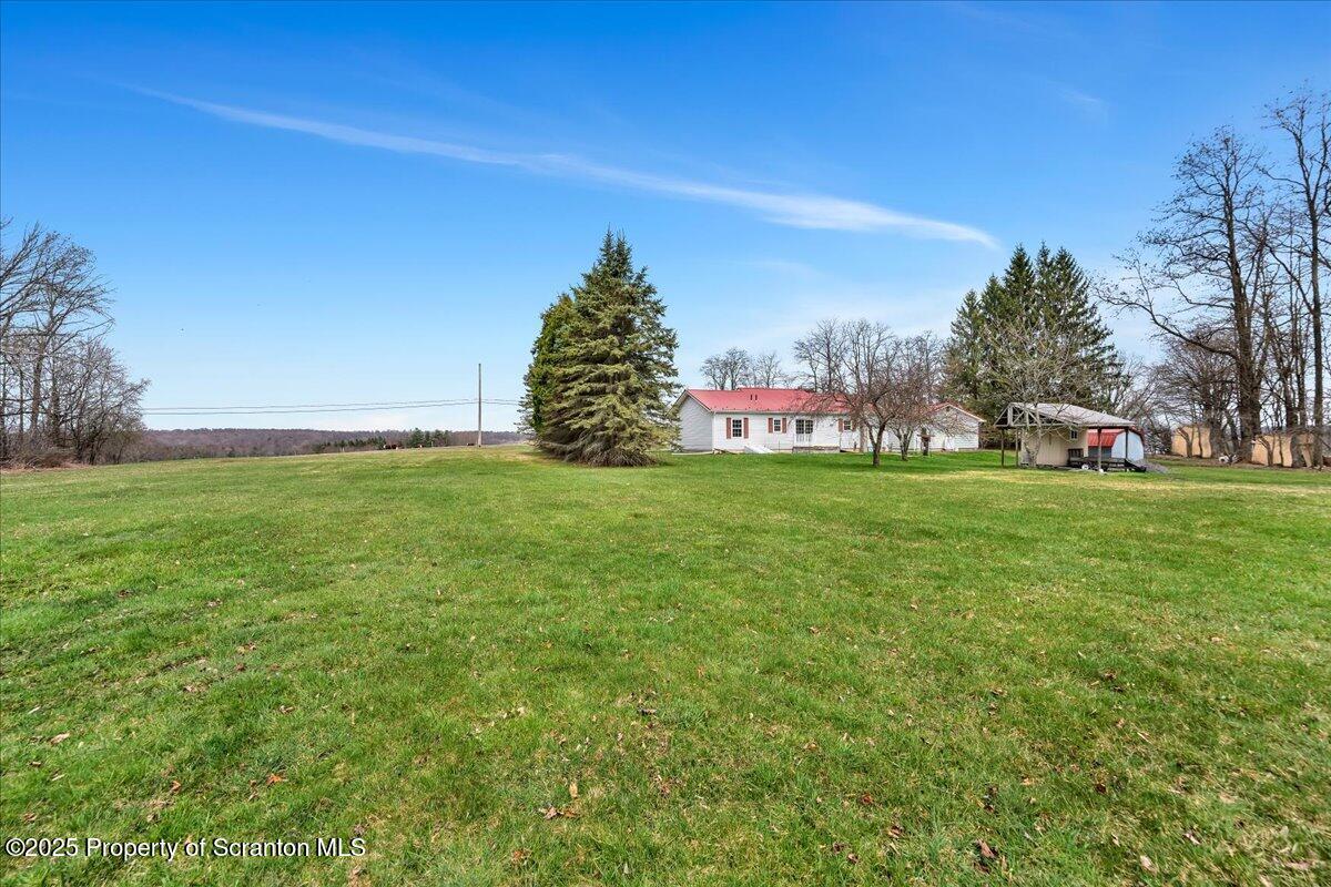 3330 Quicktown Road Moscow, PA 18444 - Photo 28 of 34 a view of a field of grass and trees