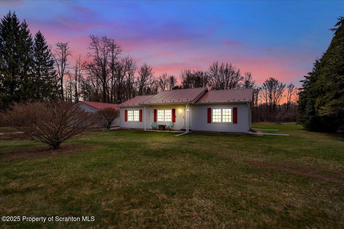 3330 Quicktown Road Moscow, PA 18444 - Photo 33 of 34 a view of a big yard with a house in the background
