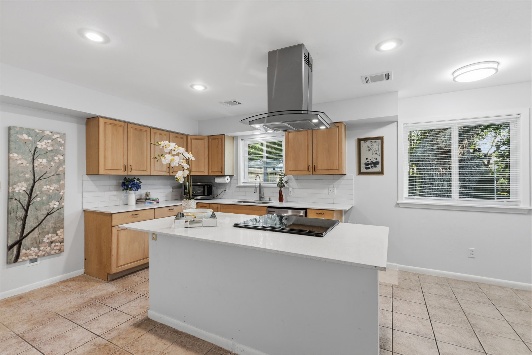 5410 Indigo Street Houston, TX 77096 - Photo 12 of 30 Great view of kitchen with sleek countertops, a Chef's Island and tons of cabinets and breakfast area.
