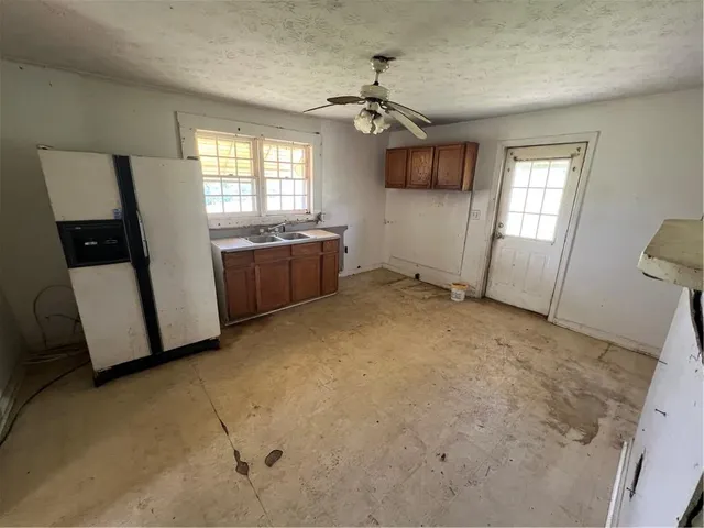 an empty room with windows