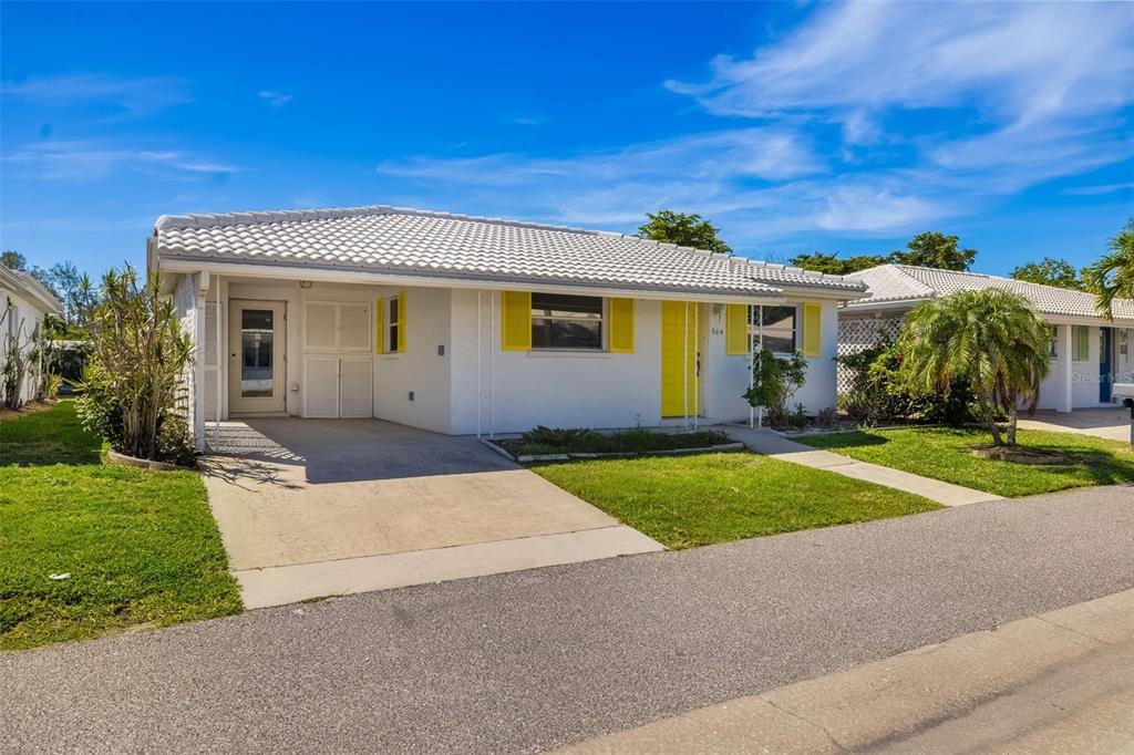a view of outdoor space yard and front view of a house