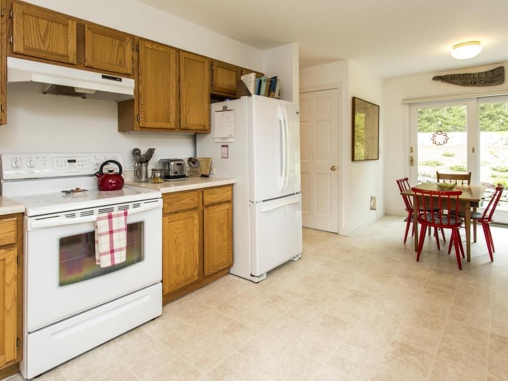 6 Harris Point Road Boothbay Harbor, ME 04538 - Photo 9 of 33 Kitchen with refrigerator, electric...