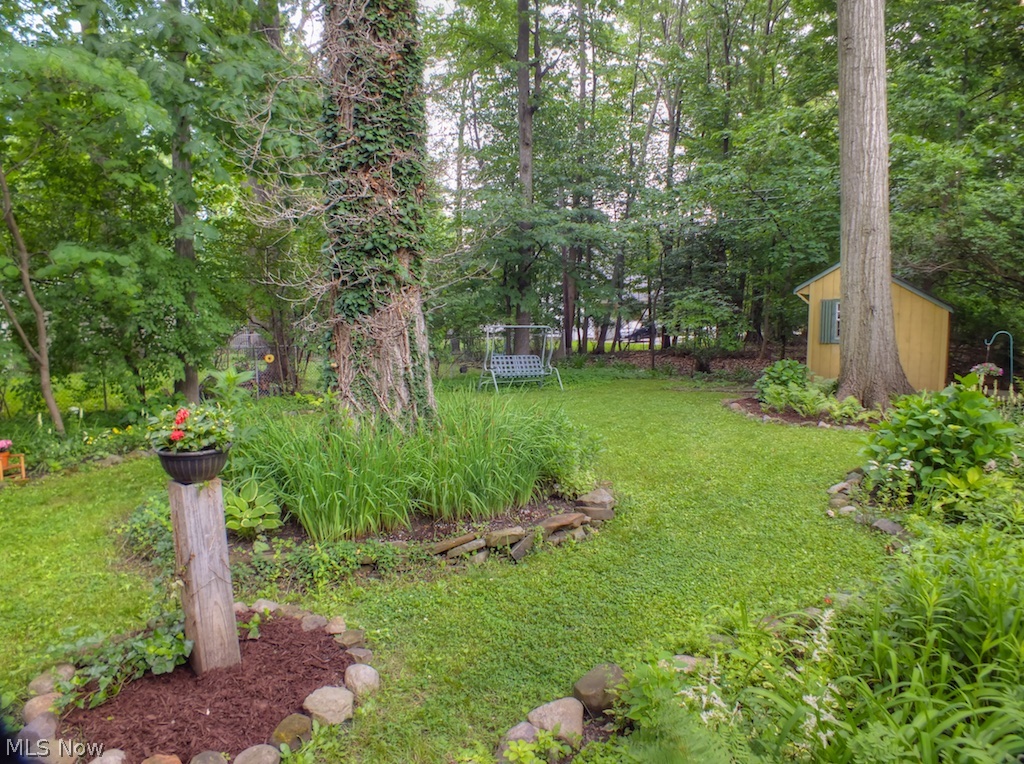 1767 Oakmount Road South Euclid, OH 44121 - Photo 22 of 25 Another view of the lovely grounds with the most charming shed in the back...