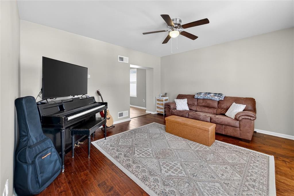 126 West Ranson Avenue Blairsville, PA 15717 - Photo 15 of 27 a living room with furniture and a flat screen tv