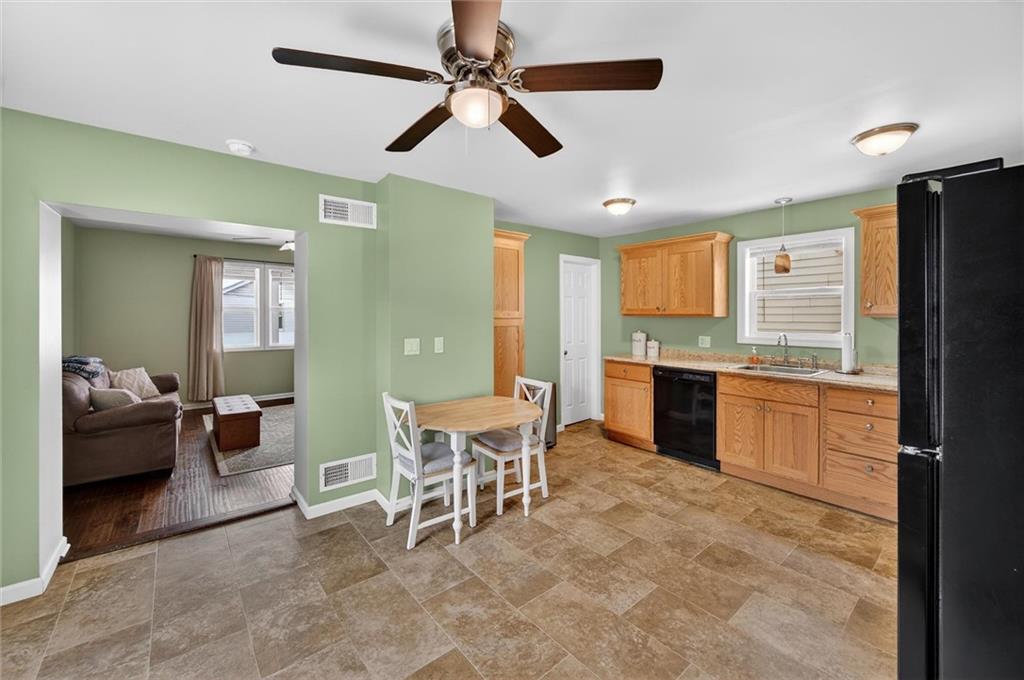 126 West Ranson Avenue Blairsville, PA 15717 - Photo 9 of 27 a large kitchen with a table and chairs
