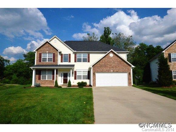 283 Wildbriar Road Fletcher, NC 28732 - Photo 1 of 13 a front view of a house with garden