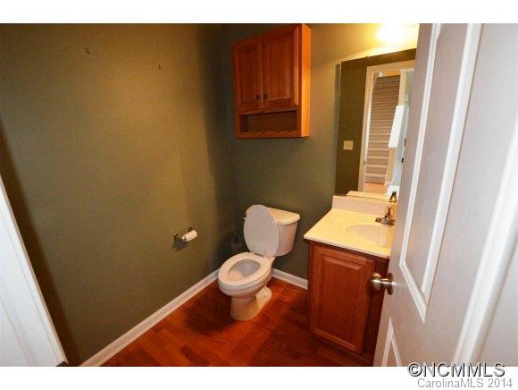 283 Wildbriar Road Fletcher, NC 28732 - Photo 8 of 13 a bathroom with a toilet and a sink