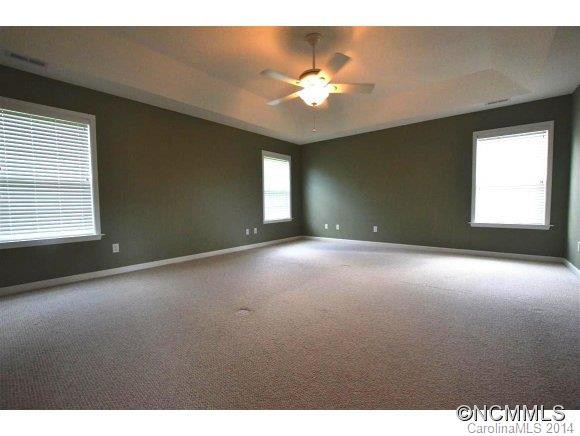 283 Wildbriar Road Fletcher, NC 28732 - Photo 10 of 13 a view of a livingroom with a ceiling fan and window