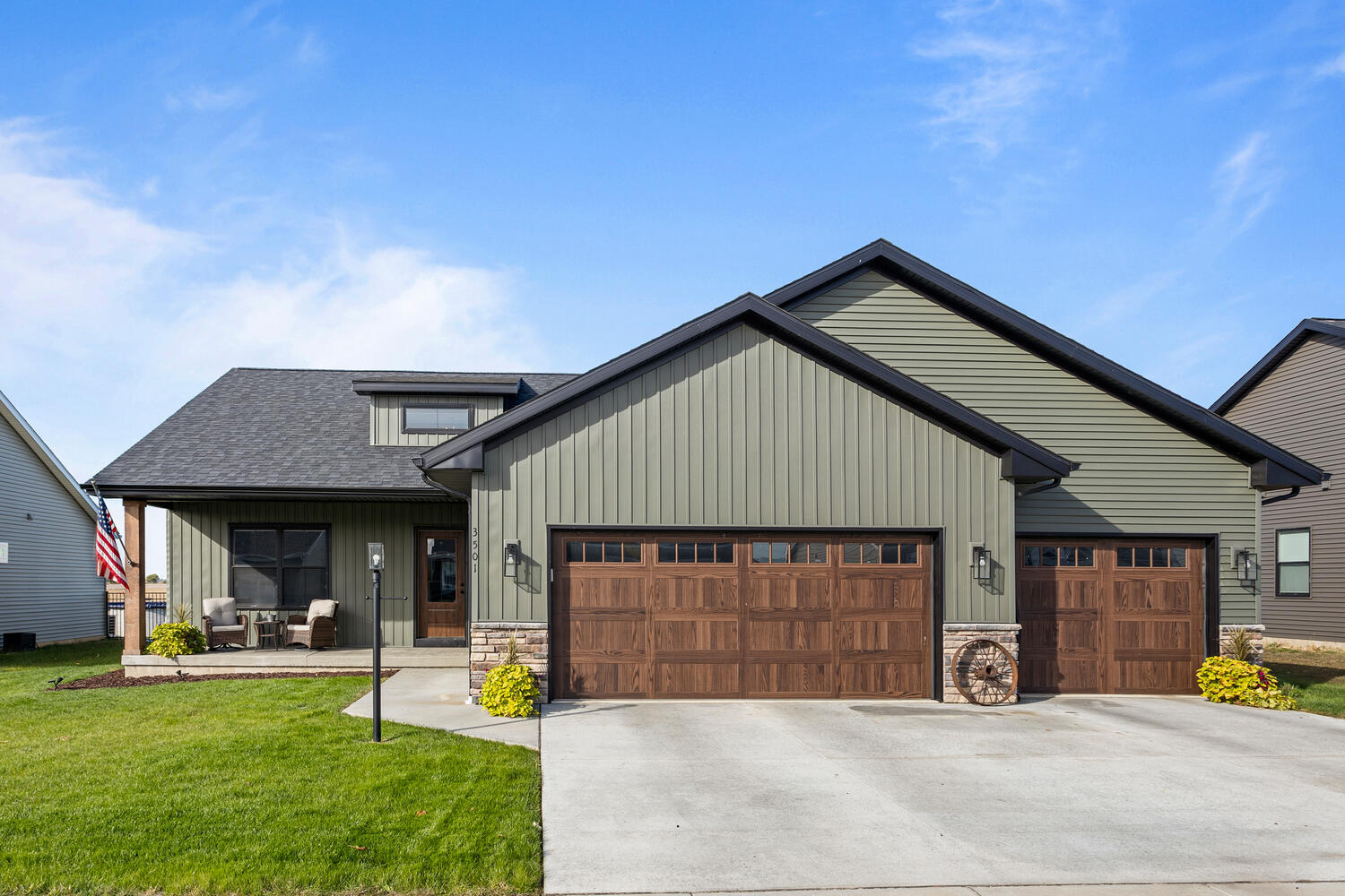 a view of a house with backyard porch and sitting area