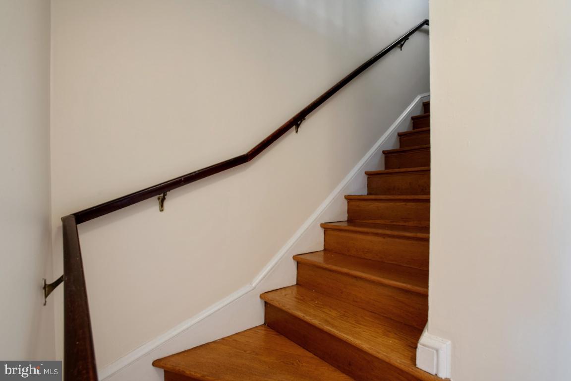1136 South Blue Ridge Avenue Culpeper, VA 22701 - Photo 17 of 38 Curved stairwell