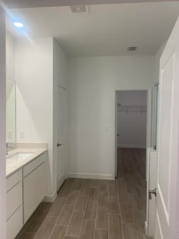 a view of a room with racks on the wall