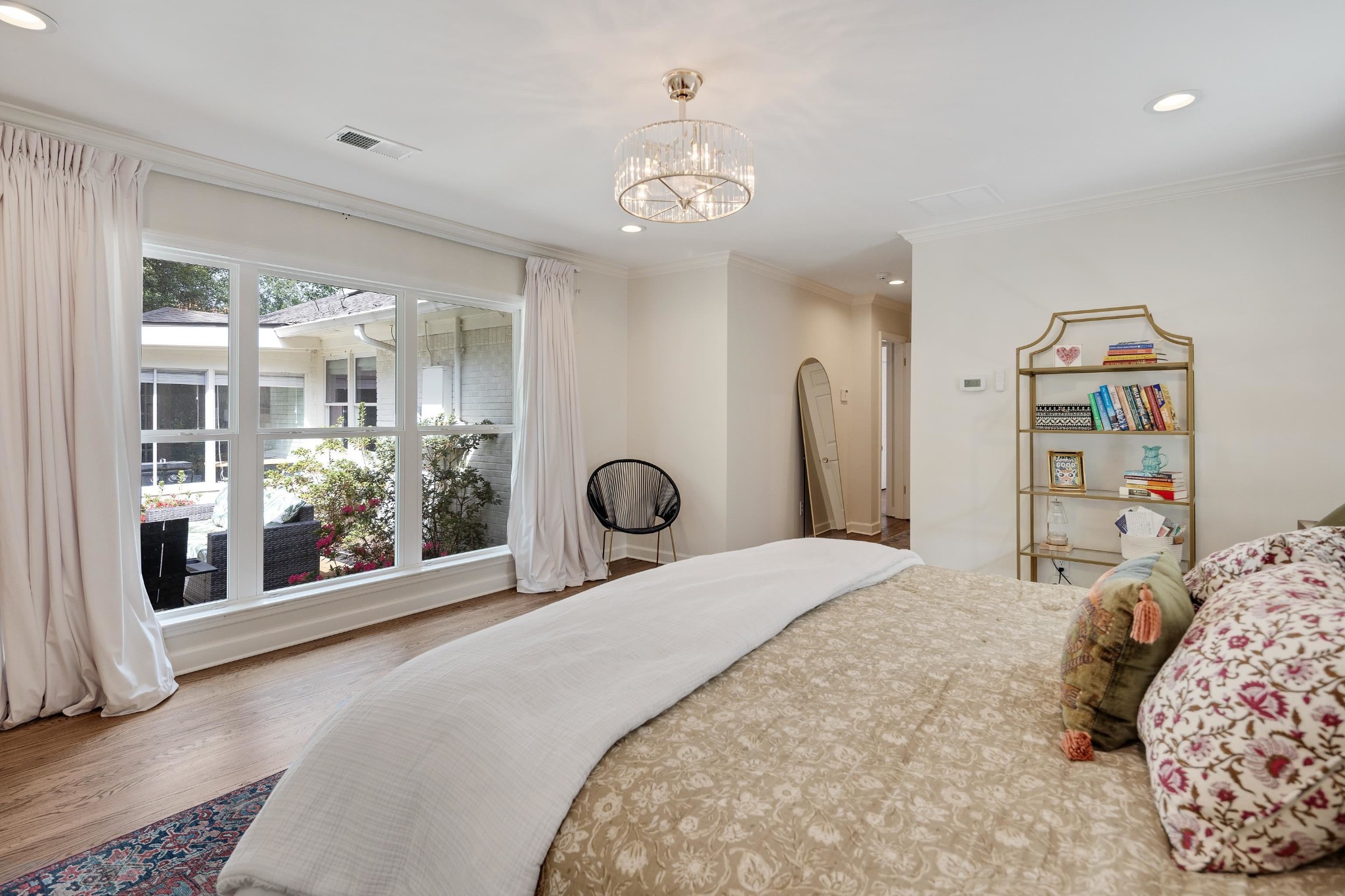267 Barry Road Memphis, TN 38117 - Photo 19 of 40 a bedroom with a large bed and a large window