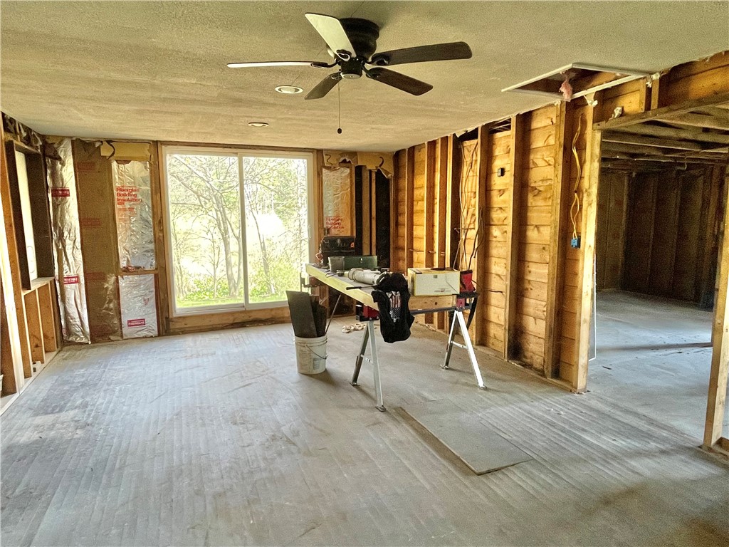 375 Log Cabin Road Victor, NY 14564 - Photo 13 of 23 Living room with sliding glass doors to the back.
