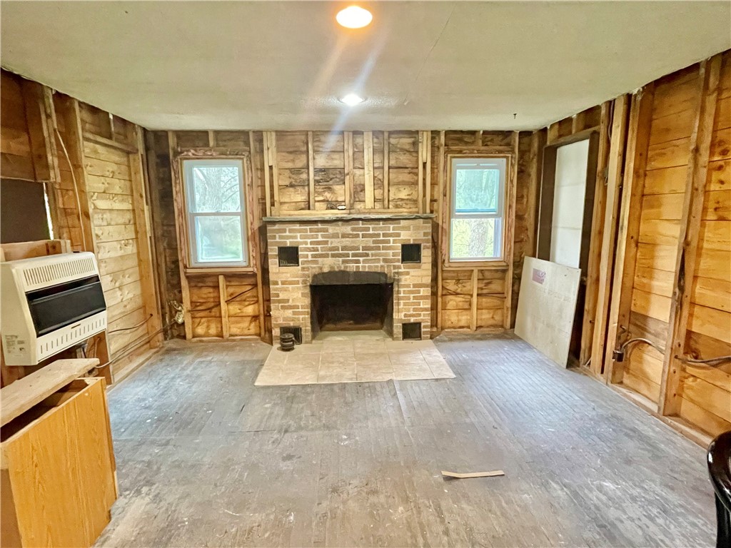 375 Log Cabin Road Victor, NY 14564 - Photo 14 of 23 Living room with wood burning fireplace & a propan