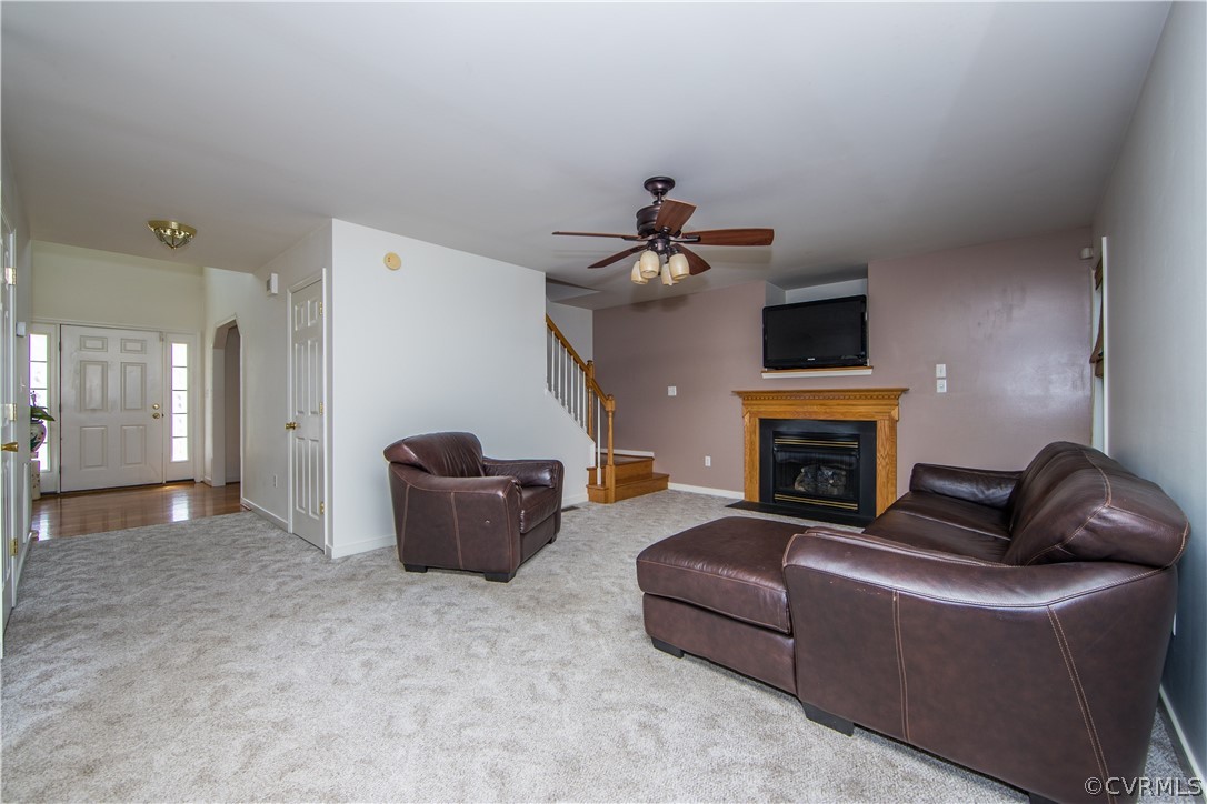 5300 Takach Road Prince George, VA 23875 - Photo 13 of 35 a living room with furniture and a fireplace