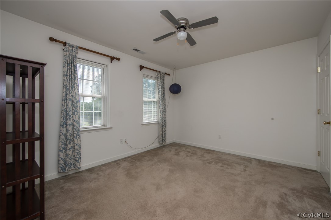 5300 Takach Road Prince George, VA 23875 - Photo 20 of 35 wooden floor in an empty room with a window