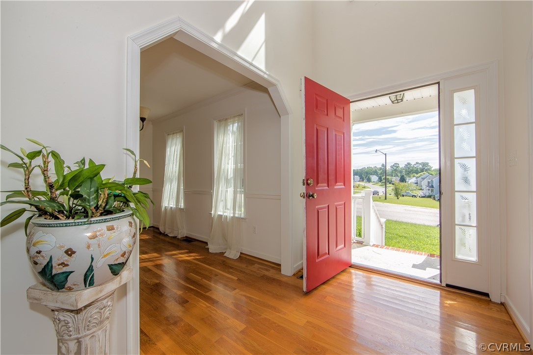 5300 Takach Road Prince George, VA 23875 - Photo 2 of 35 a view of an entryway with wooden floor and a potted plant
