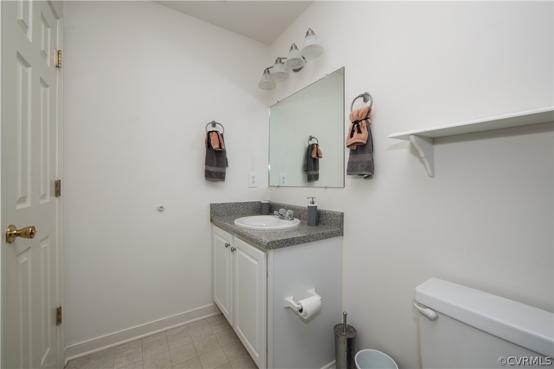 5300 Takach Road Prince George, VA 23875 - Photo 25 of 35 a bathroom with a sink toilet and mirror