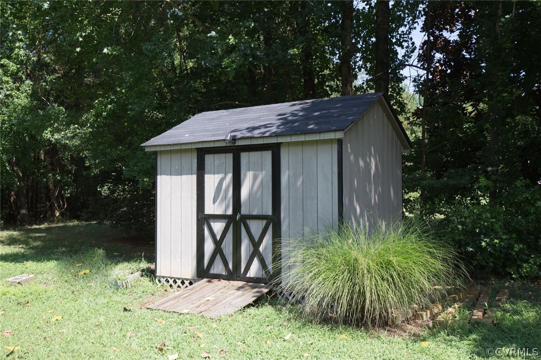 5300 Takach Road Prince George, VA 23875 - Photo 30 of 35 a view of a backyard with a barn