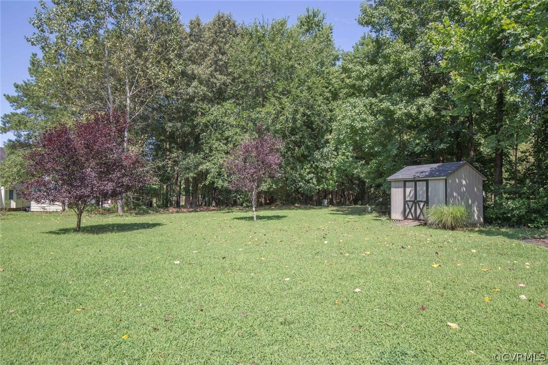 5300 Takach Road Prince George, VA 23875 - Photo 31 of 35 a view of a big yard with a house in the background