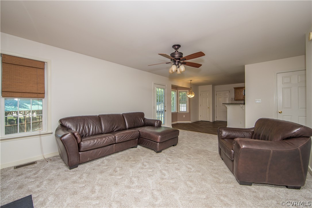 5300 Takach Road Prince George, VA 23875 - Photo 10 of 35 a living room with furniture ceiling fan and a window