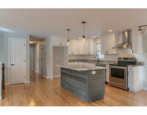 3 Needham Road Westminster, MA 01473 - Photo 4 of 30 a kitchen with stainless steel appliances granite countertop a stove a sink and a refrigerator
