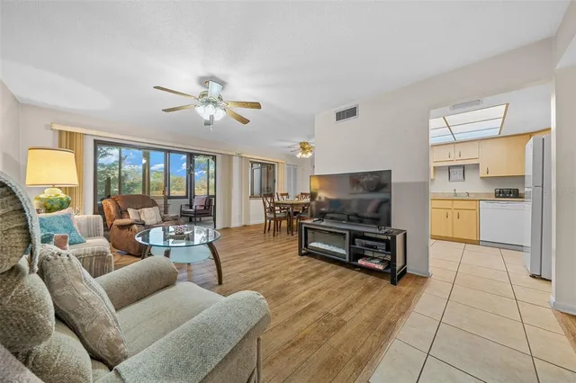 a kitchen that has a cabinets and white appliances