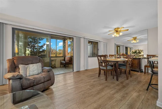 a view of a house with swimming pool and yard