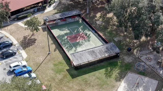 an aerial view of lake residential houses with swimming pool and outdoor space