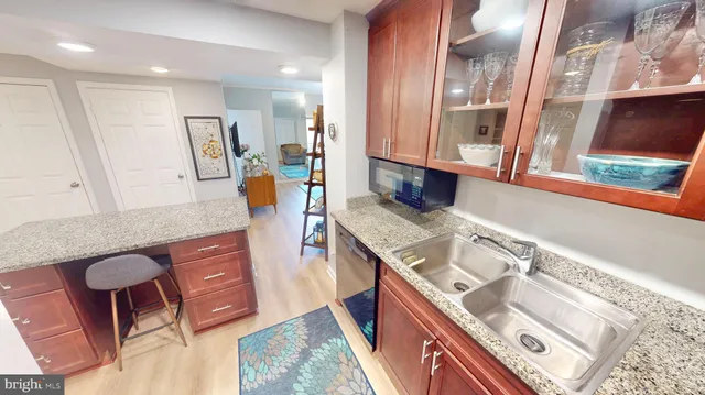 a bedroom with a bed and a chair