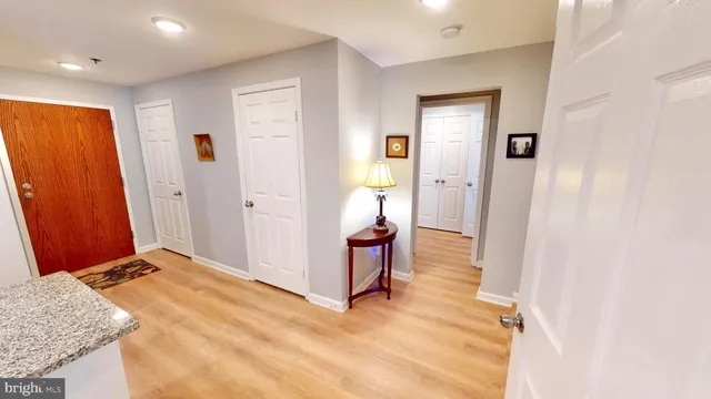 a spacious bathroom with a double vanity sink and a mirror