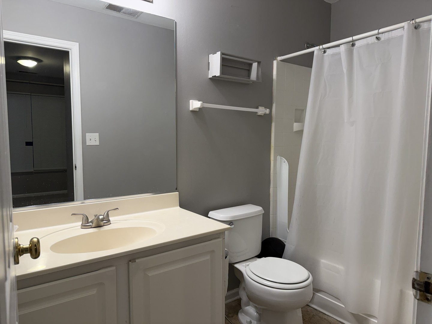 3367 Ravinia Circle Aurora, IL 60504 - Photo 11 of 14 a bathroom with a sink and a toilet