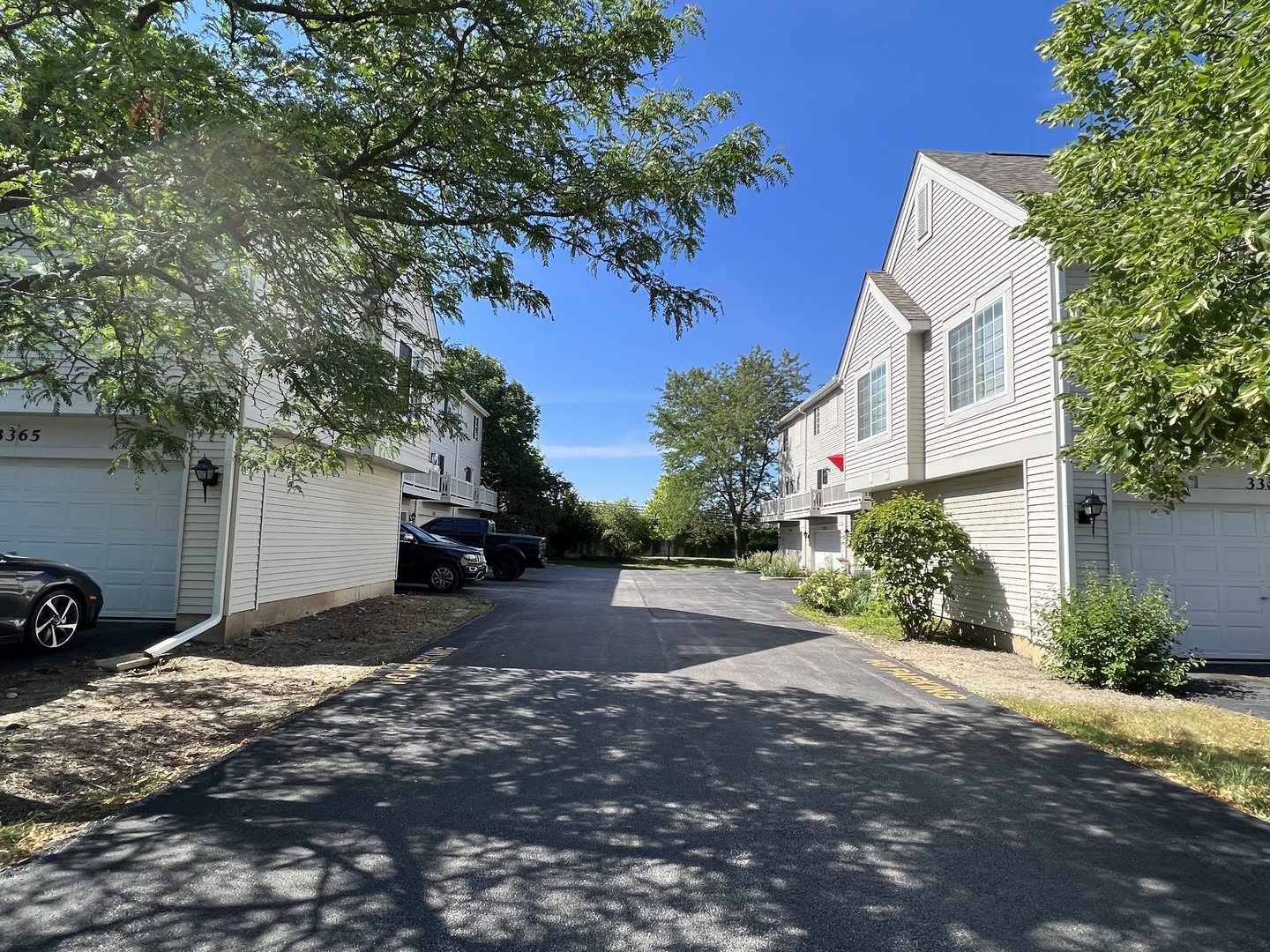 3367 Ravinia Circle Aurora, IL 60504 - Photo 14 of 14 a view of a house with a street